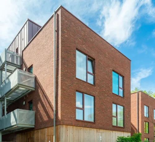 Facade_gevel_Laeken_rampe_romaine_granoquartz_rouge