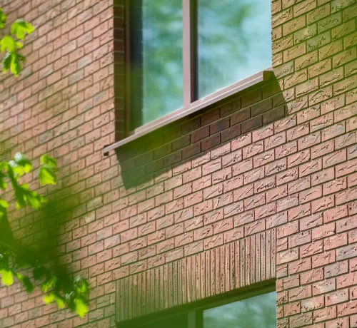 Facade_gevel_Laeken_rampe_romaine_granoquartz_rouge