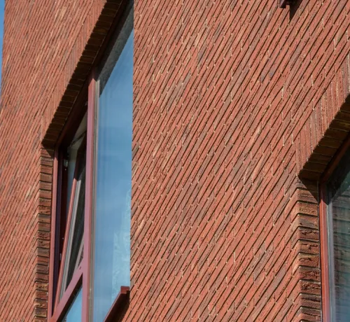 Facade_gevel_Laeken_rampe_romaine_granoquartz_rouge