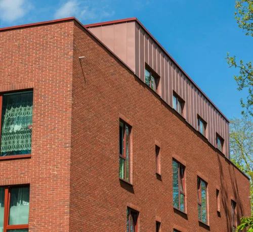 Facade_gevel_Laeken_rampe_romaine_granoquartz_rouge