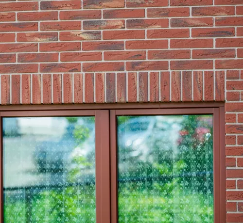 Facade_gevel_Laeken_rampe_romaine_granoquartz_rouge